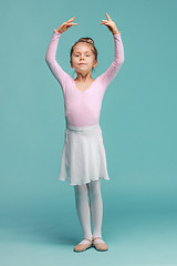 Image showing The little balerina dancer on blue background