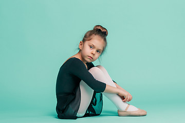 Image showing The little balerina dancer on blue background