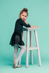 Image showing The little balerina dancer on blue background