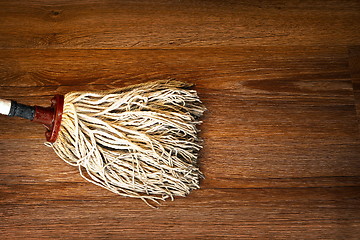 Image showing detail of mop cleaning on wood floor