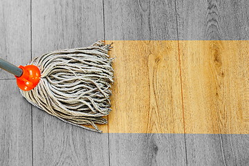 Image showing washing dust on wooden floor with mop