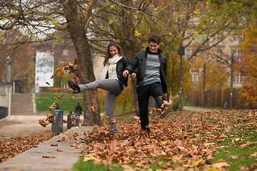 Image showing Happy young Couple in Autumn Park