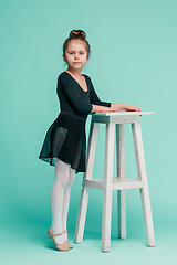 Image showing The little balerina dancer on blue background