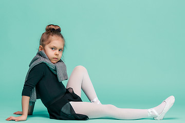 Image showing The little balerina dancer on blue background