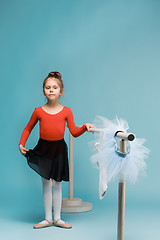 Image showing The little balerina dancer on blue background