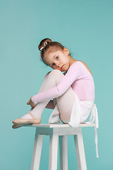 Image showing The little balerina dancer on blue background