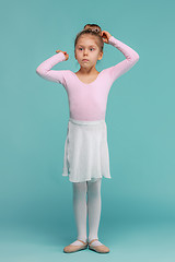 Image showing The little balerina dancer on blue background