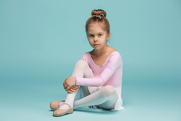 Image showing The little balerina dancer on blue background