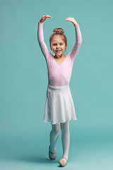 Image showing The little balerina dancer on blue background