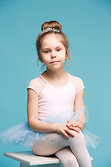 Image showing The little balerina dancer on blue background