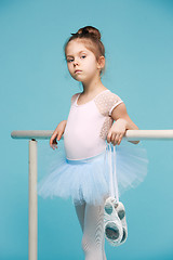 Image showing The little balerina dancer on blue background