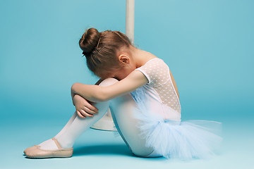 Image showing The little balerina dancer on blue background