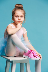 Image showing The little balerina dancer on blue background