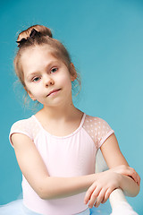 Image showing The little balerina dancer on blue background