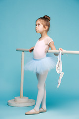 Image showing The little balerina dancer on blue background