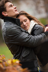 Image showing Autumn portrait of attractive happy couple