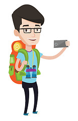 Image showing Man with backpack making selfie.