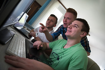 Image showing a group of graphic designers at work