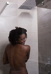 Image showing African American woman in the shower