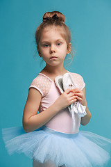 Image showing The little balerina dancer on blue background