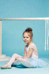 Image showing The little balerina dancer on blue background