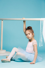 Image showing The little balerina dancer on blue background