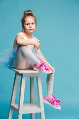 Image showing The little balerina dancer on blue background