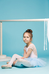 Image showing The little balerina dancer on blue background