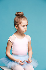 Image showing The little balerina dancer on blue background