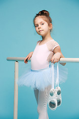 Image showing The little balerina dancer on blue background