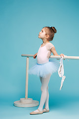 Image showing The little balerina dancer on blue background