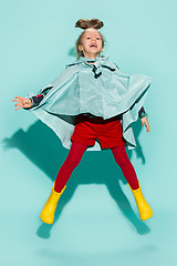 Image showing Little girl posing in fashion style wearing autumn clothing.