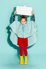 Image showing Little girl posing in fashion style wearing autumn clothing.