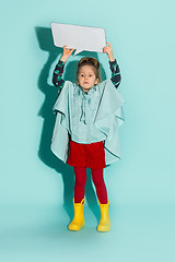 Image showing Little girl posing in fashion style wearing autumn clothing.