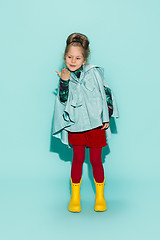 Image showing Little girl posing in fashion style wearing autumn clothing.