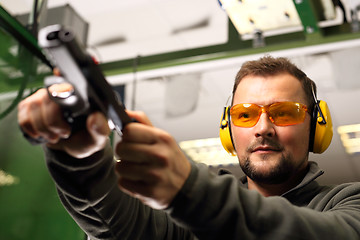 Image showing Sport shooting range. The man at the shooting range.