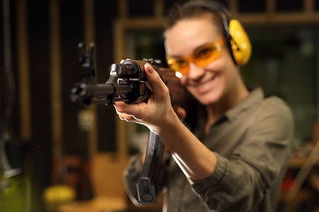 Image showing The woman at the shooting range.