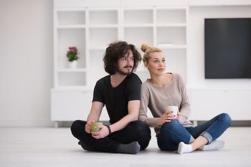 Image showing young couple in their new home