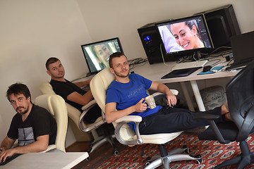 Image showing a group of graphic designers at work