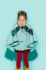 Image showing Little girl posing in fashion style wearing autumn clothing.