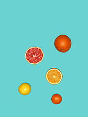 Image showing The group fresh fruits against blue background