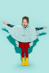 Image showing Little girl posing in fashion style wearing autumn clothing.