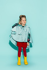 Image showing Little girl posing in fashion style wearing autumn clothing.