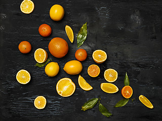 Image showing The group fresh fruits against black background