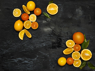 Image showing The group fresh fruits against black background