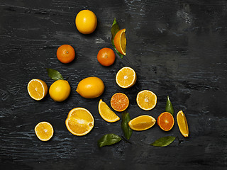 Image showing The group fresh fruits against black background