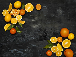 Image showing The group fresh fruits against black background