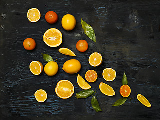 Image showing The group fresh fruits against black background