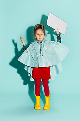 Image showing Little girl posing in fashion style wearing autumn clothing.