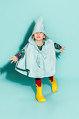 Image showing Little girl posing in fashion style wearing autumn clothing.